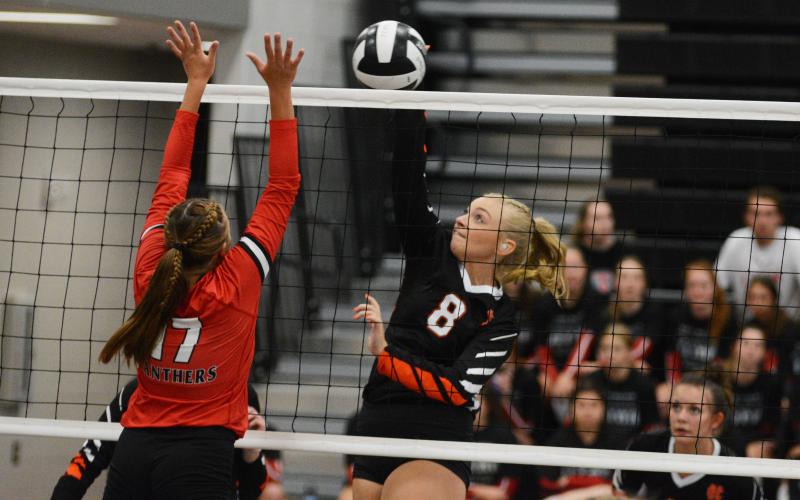 Cali Beebe goes for the kill against Jackson County on Aug. 18.