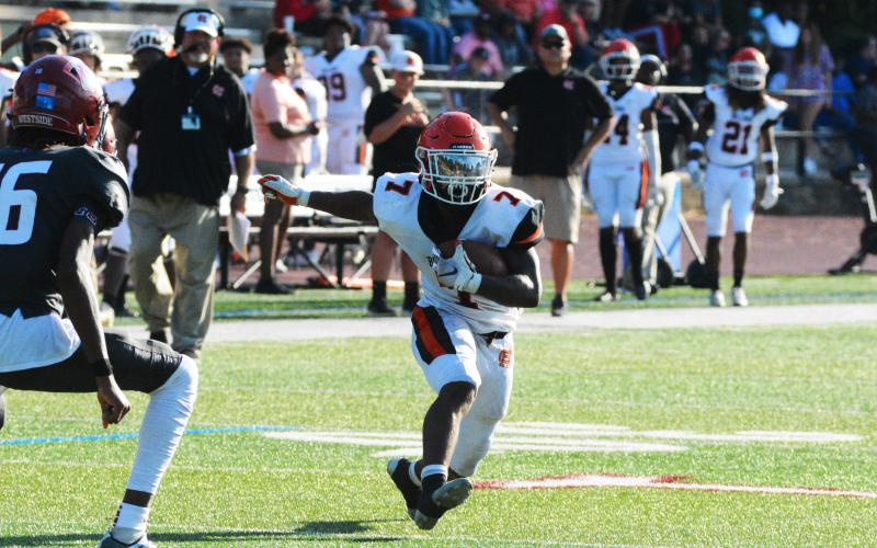 Nori Moore cuts to reverse field and score a touchdown against Westside on Aug. 12.
