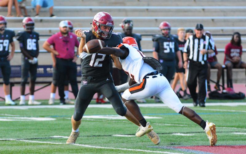 osh Jones forces the fumble from the Westside quarterback.