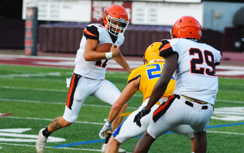 Paul Davis looks for space on a punt return.