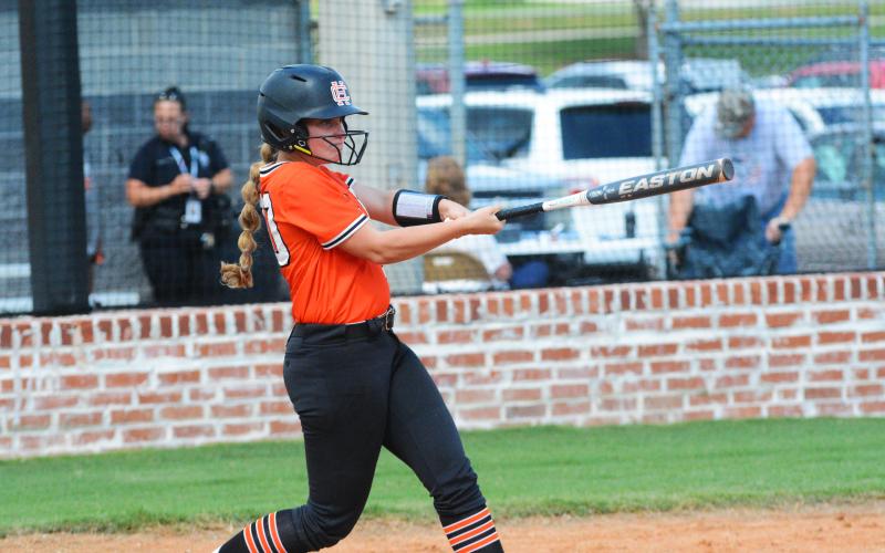 Allie O’ Bannon gets a base knock in the Lady Dogs’ first game of the season against Gainesville on Friday, Aug. 5.
