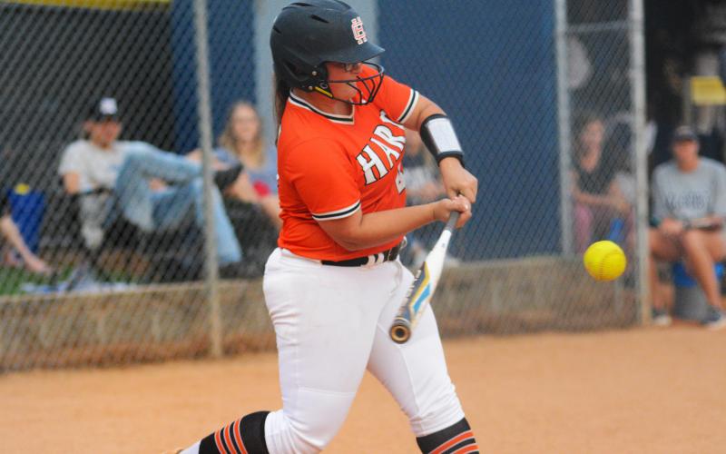 Alexis Davis makes contact against Elbert County on Aug. 23.