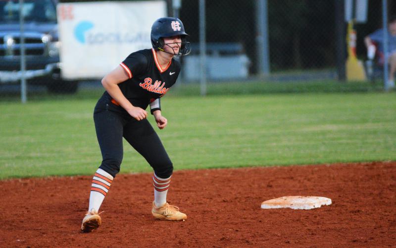 Lydia Burroughs looks to steal from second base.