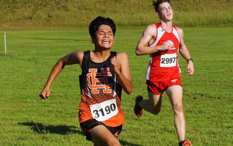 Luis Genchi pushes at the finish line to secure a silver medal in Toccoa.