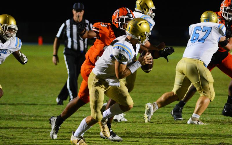 Chaiden Harland gets the sack on the Daniel quarterback.