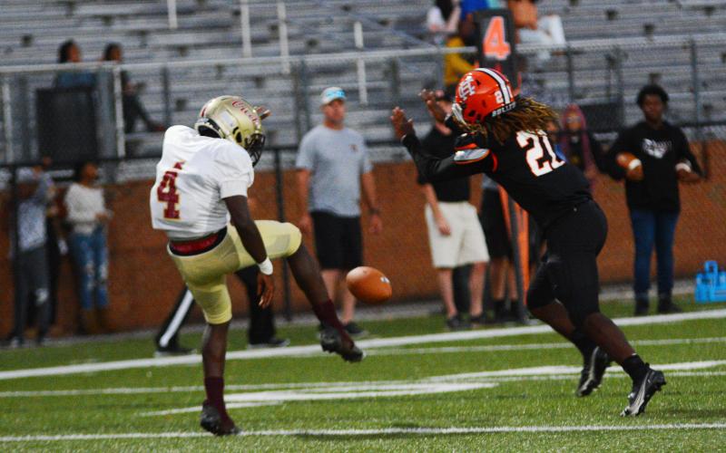 Andre Austin blocks the first Cross Creek punt of the game.