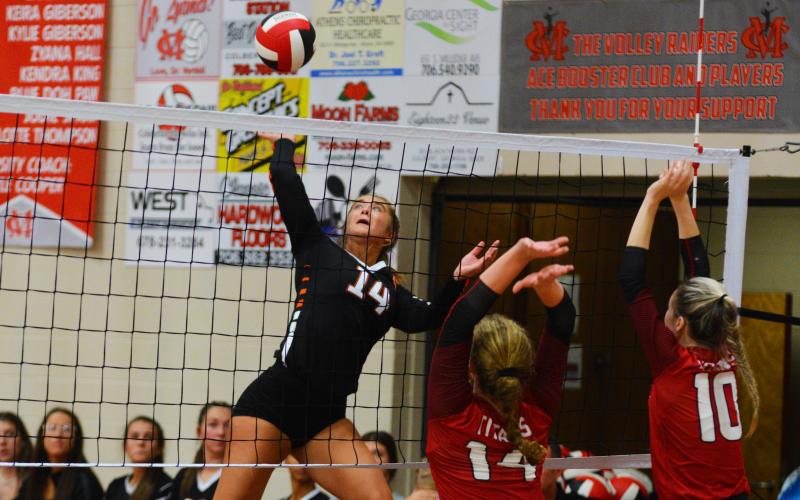Dakota Phillips goes for the kill against North Oconee on Sept. 8.