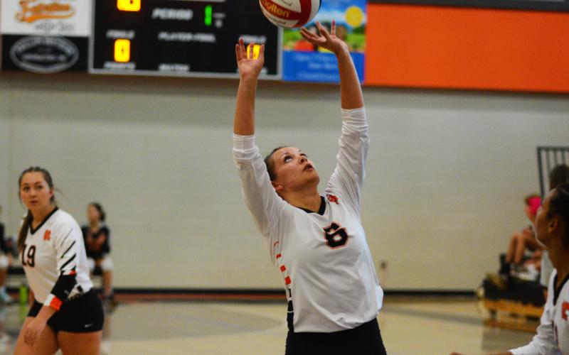 Jazania Shealer makes contact in the team’s home game on Thursday, Aug. 25.