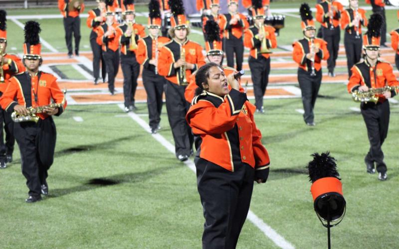 Pictured right, Jada Phelps performs a vocal solo.