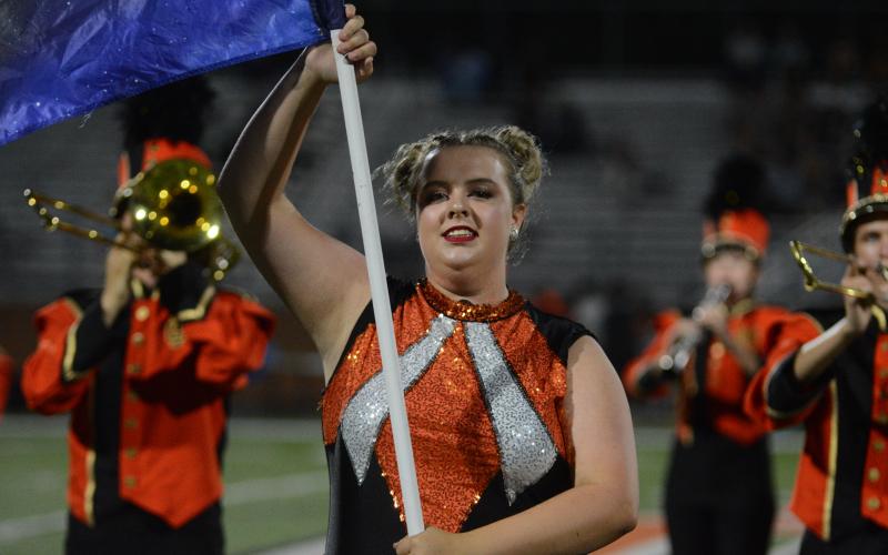Flag corps member Avery Adams performs her part in the band’s program “Beyond”.