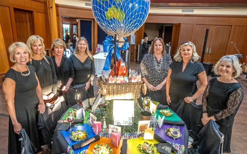 The first place fundraising table consisting of: left side front - Gale Hulme, Kim Reynolds, Mary Brooks Hogan and Kathy Gjesvold; right side front - Marguerite Shackleford, Lynn Betz and Dixie Northrup.