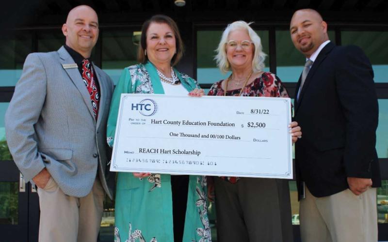 Pictured left to right top are Associate Superintendent Brooks Mewborn, Hart County Education Foundation Executive Director Bobbie Busha, Hart Telephone Company Executive Vice President Wyndee McKinnon, and Hart College and Career Academy CEO Steve Burton.