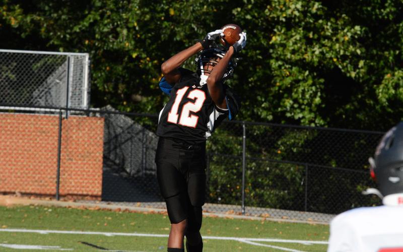 Kurston Curry makes a grab and takes the ball to the endzone for a touchdown for the first score.