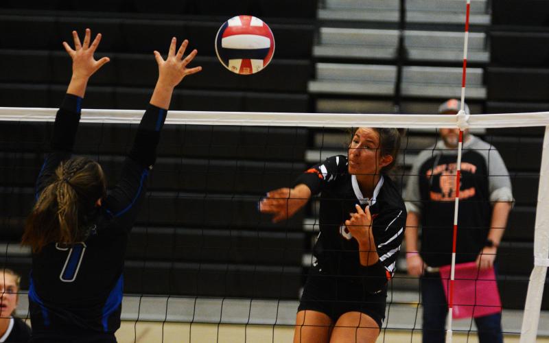 Lillie Rogers goes for the kill in the loss to Oconee County on Oct. 4.