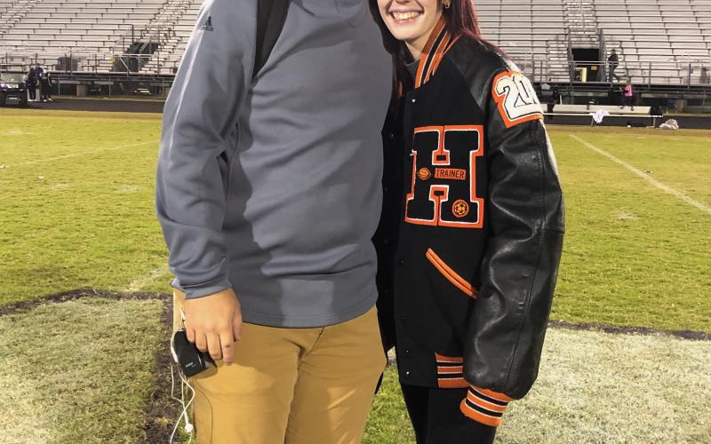 My wife Madison and I after the 2019 home game against Monroe Area.
