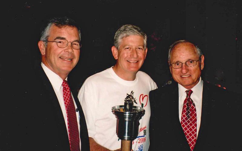 To celebrate the 10th anniversary of the 1996 Olympics, Athens and the University of Georgia re-enacted the torch run. As chairman of Athens 96, I invited Billy Payne, left, and Vince Dooley, right, to speak at the ceremony.