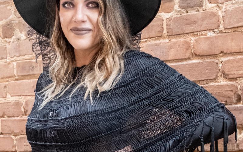 Natalie Floyd gets witchy in downtown Hartwell on Halloween night.