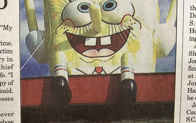 Pictured above is the original Sun article highlighting the giant inflatable Spongebob prior to its theft from the roof of Burger King.