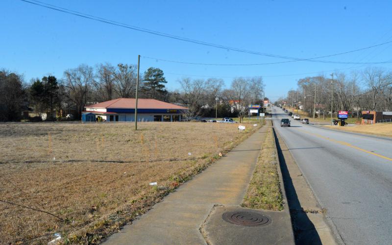 Pictured above is the location of the 1.9-acre lot along Franklin Street adjacent to Napa Auto Parts where a Dunkin' Donuts and Firehouse Subs is planned.