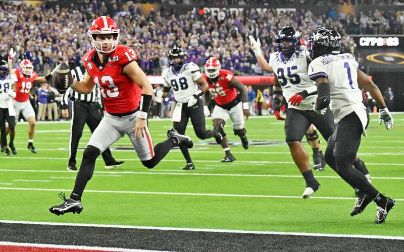 Having advanced from walk-on quarterback to superstar, Stetson Bennett played his last game for the Georgia Bulldogs on Monday night in California’s SoFi Stadium. The sixth-year senior won his fifth Offensive Player MVP award in the last five playoff games, including the CFP National Championship game’s 65-7 thrashing of TCU. Bennett threw four touchdowns while amassing 304 yards through the air. No. 13 also rushed for two more scores. Coach Kirby Smart said that was probably Bennett’s best game ever. Now m