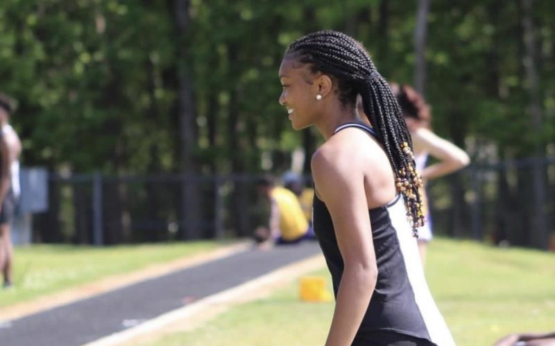 Senior Valasha Carter at a track meet in 2021 at HCHS.