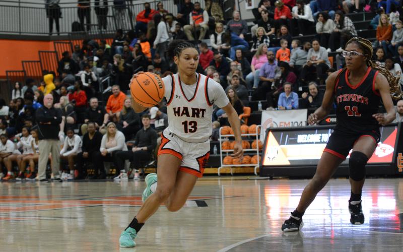 Junior guard Alexis Walker drives into the lane in the 50-23 home win over the Stephens County Lady Indians on Feb. 3.