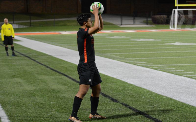 Pictured is junior defender Fabian Rodriguez Escobedo looking down the line on a throw in.