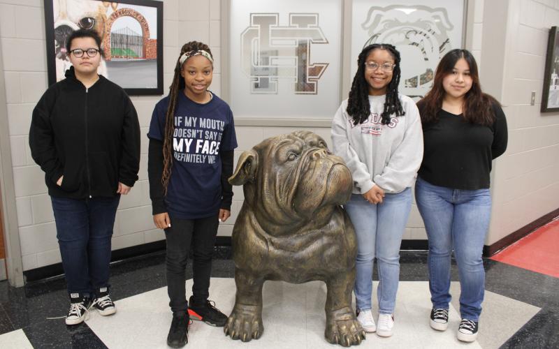 The system-wide Young Georgia Authors contest winners from Hart County High School. From left to right, ninth-grade winner Sariah Martin, tenth-grade winner Iyannah Morring, eleventh-grade winner Au’brionna McIntosh, and twelfth-grade winner Fatima Rangel.