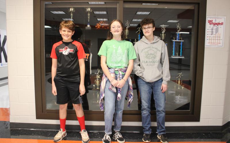 The system-wide Young Georgia Authors contest winners from Hart County Middle School. From left to right, sixth-grade winner Xavier Johnson, seventh-grade winner Zoe Chitwood, and eighth-grade winner Katherine Ripley.