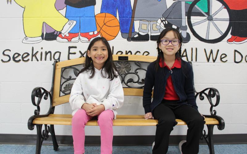 The system-wide Young Georgia Authors contest winners from South Hart Elementary School. Cecilia Le, on left, won the contest for second grade, and Thien My Luong, on right, won the contest for third grade.