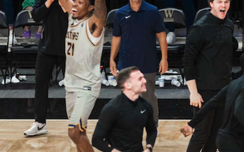Pictured left is Shone Webb with Ben Edwards pictured right celebrating after Emmanuel College wins the Conference of Carolinas championship on Sunday.