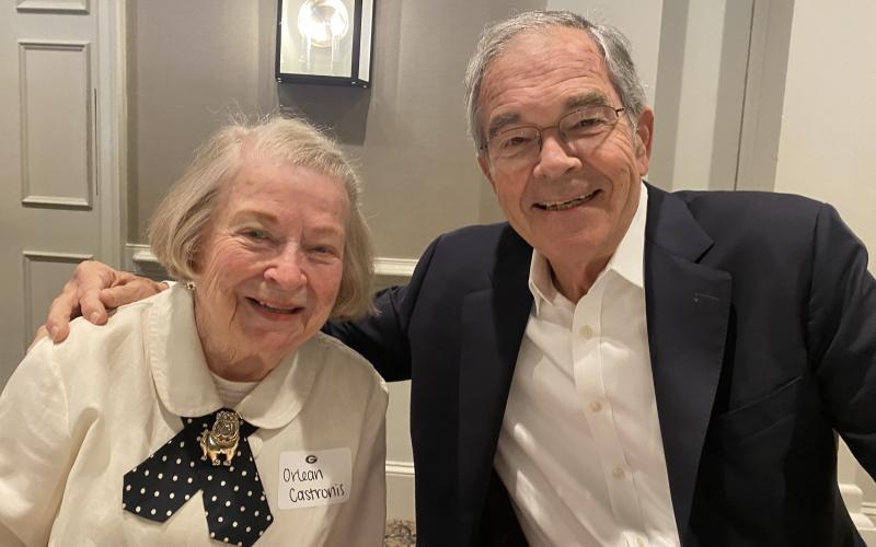 Keynote speaker Billy Payne (left) sat by Mrs. Orlean Castronis, 99, widow, of Coach Mike Castronis.