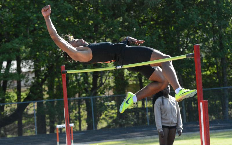 Junior Jashon Gaines advances to sectionals in the boys high jump after placing third and in the boys long jump after placing first in the GHSA Region 8-AAA meet on April 24.