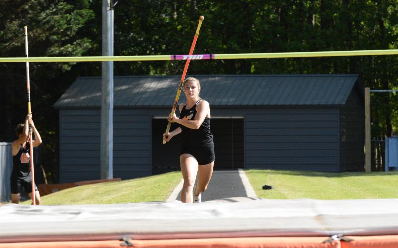 Pictured is freshman Madi Bennett as she placed first in the girls pole vault and third in the girls high jump at the home senior night track meet on Monday, April 17.