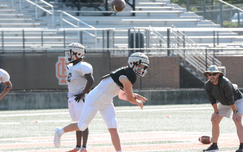 Kip Phillips throws the ball to a receiver.