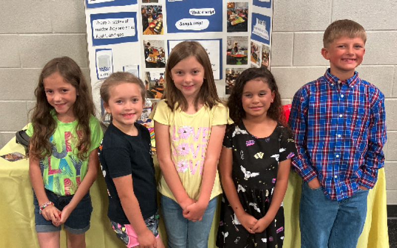 North Hart second graders (L-R) Emily Reynolds, Dalis McDonald, Pearl Davis, Karma Harris and Jase Pickens demonstrated their understanding of the states of matter at the 2023 STEAM Showcase.