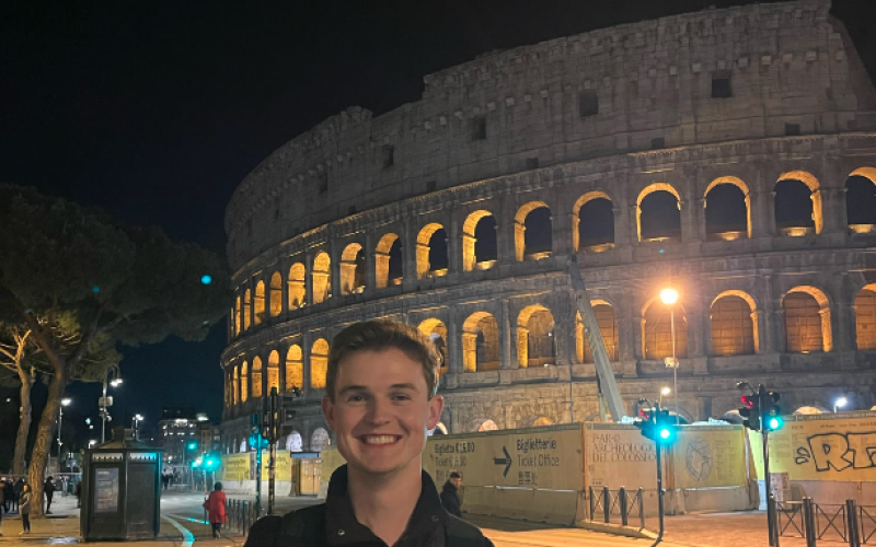 Dawson Baker stands in front of the Colosseum in Rome, Italy during Easter weekend. The Colosseum was constructed during the first century A.D.