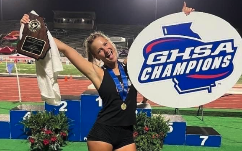 Junior pole vaulter Amelia Johnson celebrates after winning back-to-back state championships at the GHSA 3A State meet on May 11-13 in Albany.