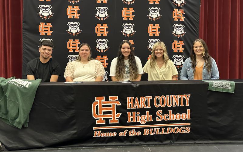 Pictured from left to right is Tyler Trujillo, Kelly Trujillo, Sofia Trujillo (signee), Coach Mollie Payne, and Ashley Risner.