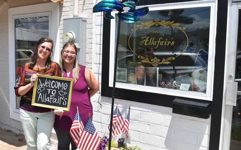 Mother-daughter duo Darlene Nixon (left) and Brooke Dutton (right) stand out front of their new business, Allafair’s, on North Forest Avenue.