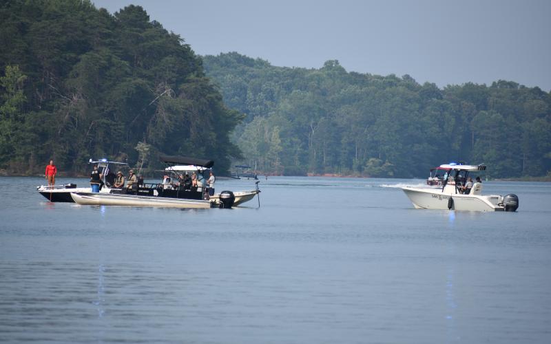 Three boats gathered around the location of where the body of 44 year-old Constantin Pascal was found late Saturday evening.