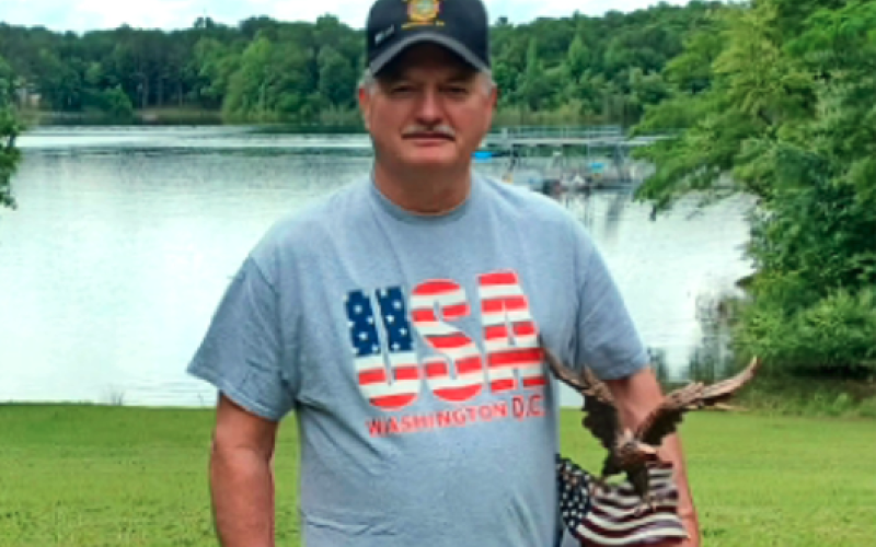Hartwell VFW Post 8076 was recognized as the top post of the NEGA district for the second quarter of 2023 at the recent district meeting in Cumming, Ga.  An impressive eagle trophy is on display at the post. Commander Ricky Sykes holds the trophy with a view of the lake behind the Post.