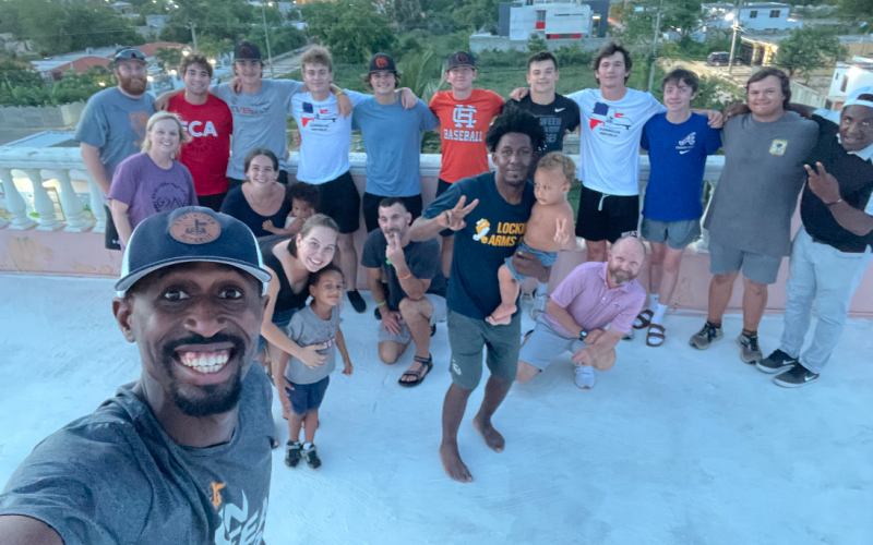 Pictured is the Hart County baseball team along with the FCA directors and families in the Dominican Republic. Pictured in the front is Miguel Terrero (FCA Dominican Republic Director). In the front row from left to right is Julie Sanders, Rhyann MacKay (FCA Dominican Republic Admin), Rose Terrero (FCA Dominican Republic Director), Chad Posey, Alvis Santana (FCA Dominican Republic Staff), and Mac Campbell (FCA South Carolina Foothills Area Director). In the back row from left to right is Coach Leland Jones,