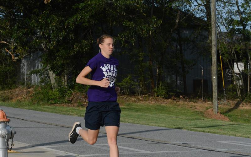 Senior runner Madison McLane working on her two mile time