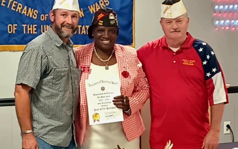 VFW Post 8076 Commander Ricky Sykes and Quartermaster Patrick Palmer receivied All-State caps from Georgia Department Commander Patsey Schreiber. Pictured from left are Quartermaster Palmer, Commander Schreiber and Commander Sykes.
