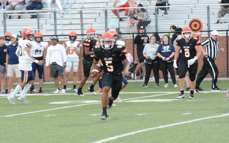 Senior quarterbacks Jashon Gaines (pictured) and Kip Phillips will continue to battle it out at the quarterback position as the Dogs are counting down the days until kickoff on Aug. 18 as they host their rival Elbert County, with kickoff at 7:30 p.m.
