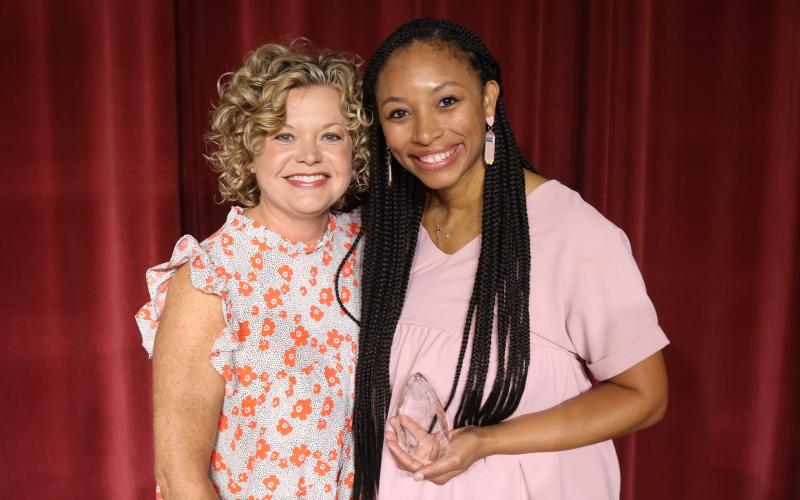 Britney Morrison, the 2023-2024 Hart County Charter System Teacher of the Year, pictured right, poses for a photo at Convocation alongside Superintendent Jennifer Carter.