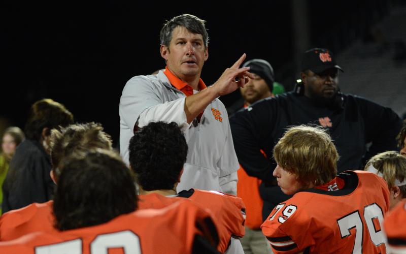 Hart County football’s head coach Cory Dickerson speaking with the team after the 35-0 loss to Stephens County Oct. 20.