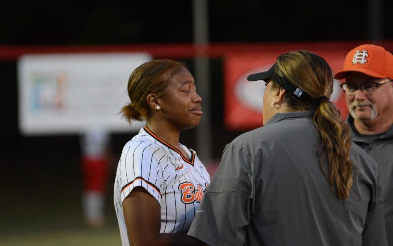 Senior infielder Jazz Shealer (left) was emotional after playing in her final game for Hart.