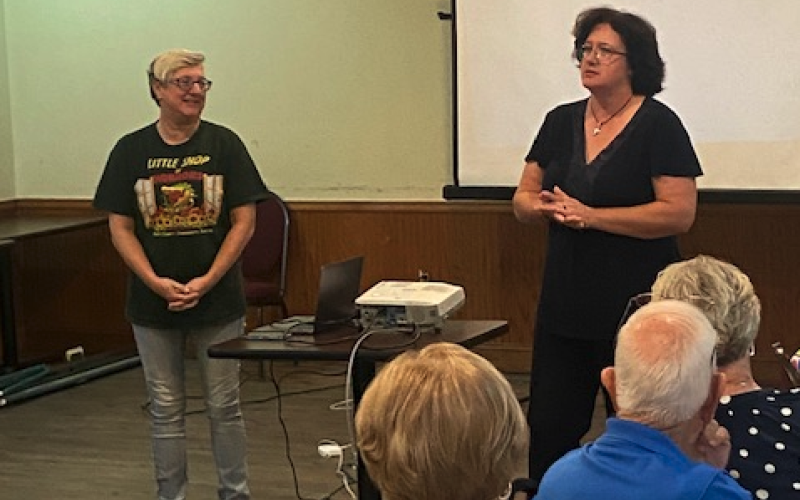 HCCT’s Lani Sessions (left ) and Sarah Martell address retired educators